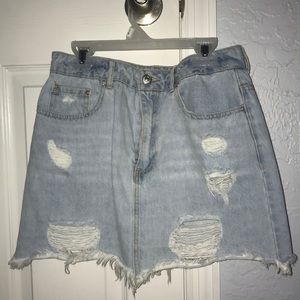 Light wash distressed jean skirt